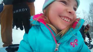 Sophie and Daddy sledding