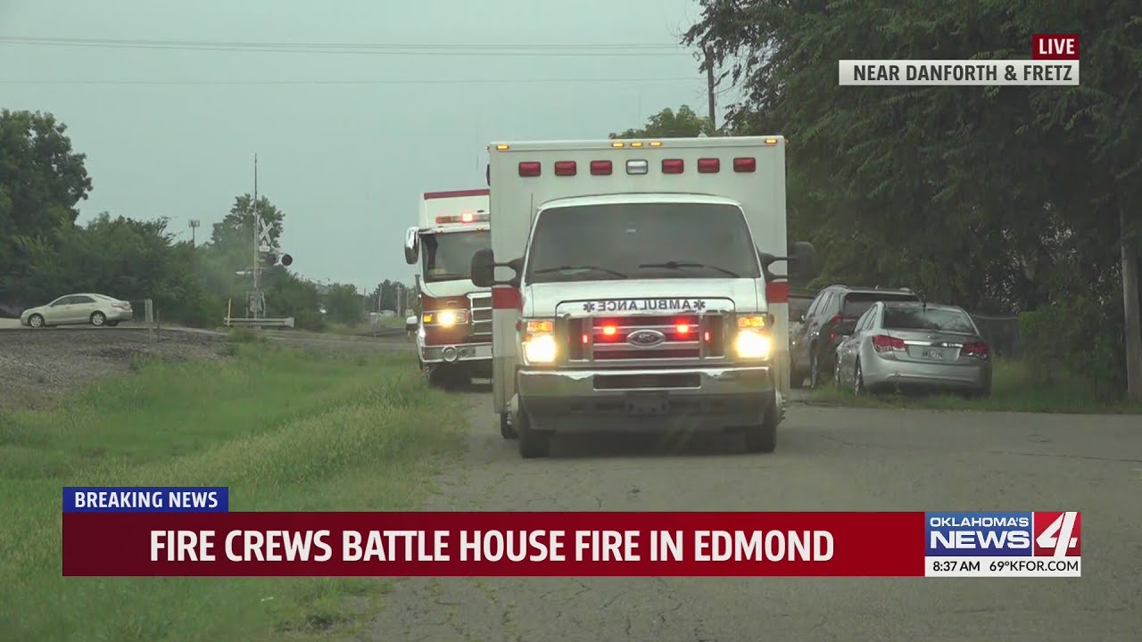Fire crews battle house fire in Edmond - YouTube