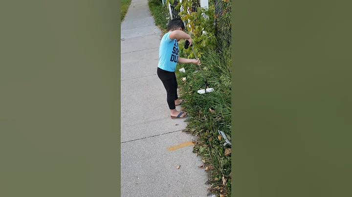He is picking up garbage