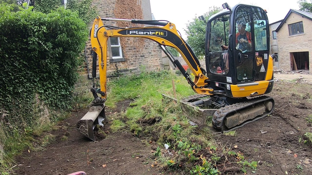 Garden clearance with excavator for extension
