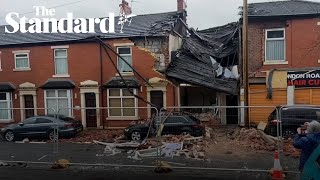 Two men rushed to hospital as explosion razes Blackburn house