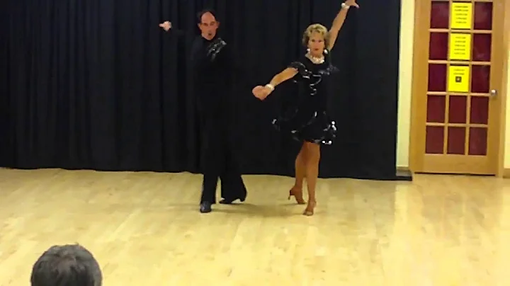Mrs. Judith Vogler and Mr. James dancing the Cha Cha at Spotlight Review