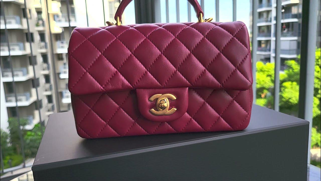 Chanel 22p Mini rectangle flap bag with top handle in red burgundy