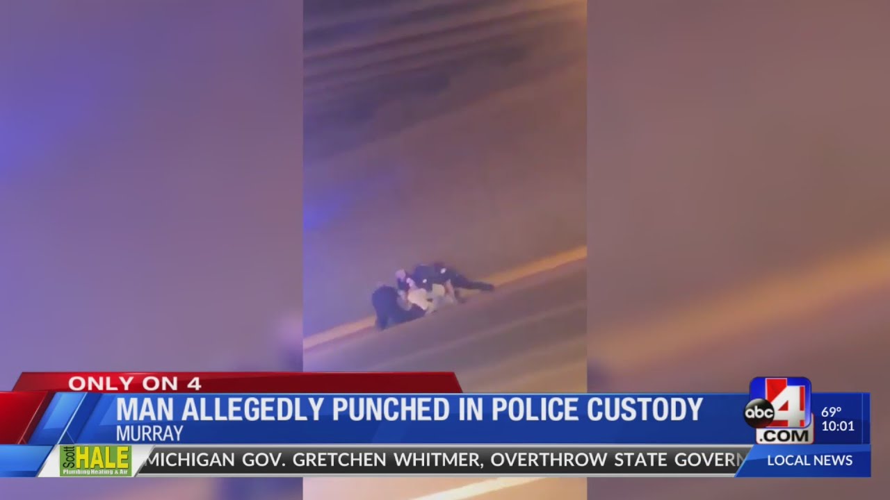 Man Allegedly Punched in Police Custody - YouTube