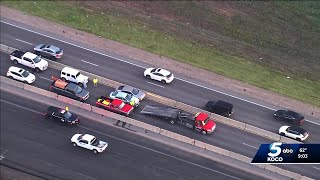 3 vehicles wedged between concrete barriers cause major traffic backup on I-40 in Midwest City