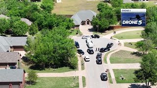 Drone video shows police investigating after 5 found dead at Yukon home
