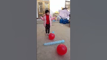 Outdoor balloon popping fun