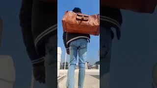 Would you go on a trip with this beautiful leather duffel bag?