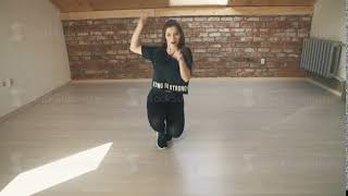 Attractive Girl Dancing Twerk At Brown Studio Background