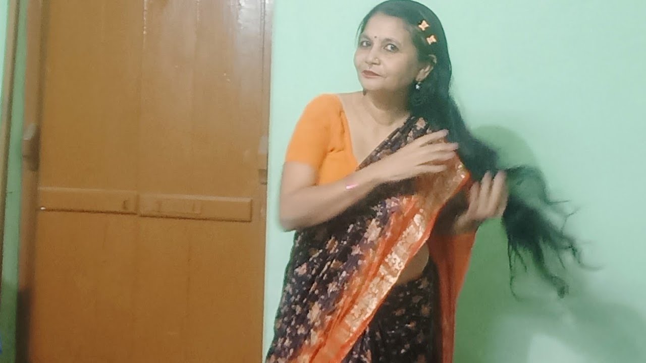 Black Orange combination saree draping