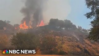 Los Angeles area schools reopen as fire containment grows