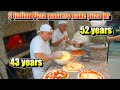 The two have a combined total of about 100 years of pizza making experience in roman pizzerias