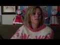 Kristen Wiig crying in a sweater