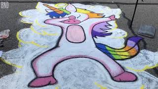 Learn the story of the dabbing unicorn at the Street Art Festival