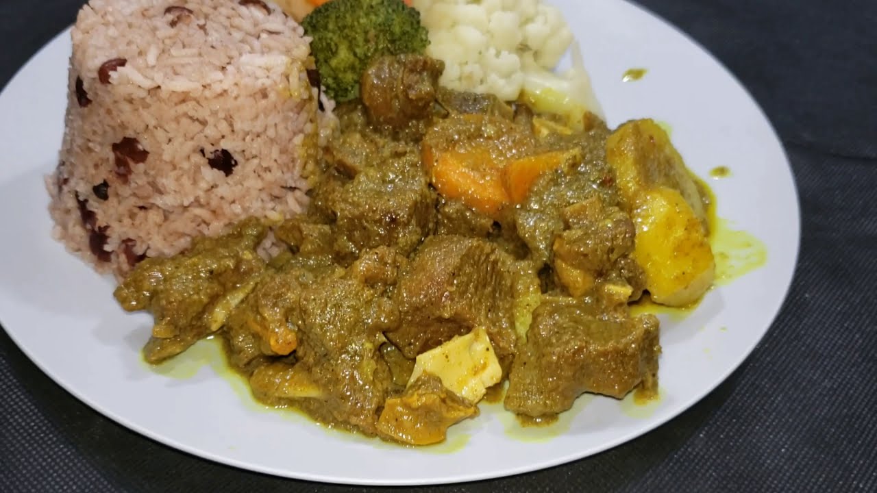 Curry Goat And Rice And Peas Sunday Dinner In Jamaica Steam Curry Goat And Rice And Peas Sunday Dinner In Jamaica Steam