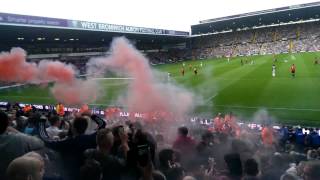 Man United fan sets smoke bomb at West Brom