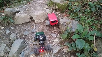 Yeah Racing & Dinky RC Cantilever kit for SCX10 test with a two thumbs up score.