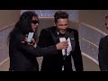 Tommy wiseau tries to steal mic from james franco but fails during 2018 golden globes speech