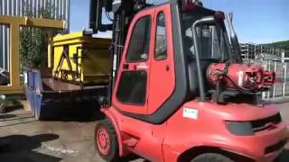 Evers: Axzion Schrottcontainer mit Bodenentleerung und Staplertaschen