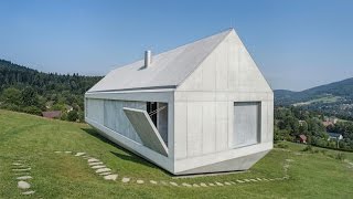 Robert Konieczny uses drawbridge to create ark-like house on a steep Polish hillside