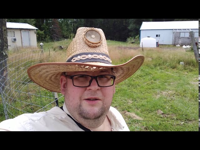 Wearing the Cowboy Straw hat with solar powered fan by Kool Breeze