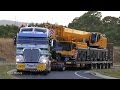 Membreys Kenworth K200 and unloading Liebherr LTM 1350