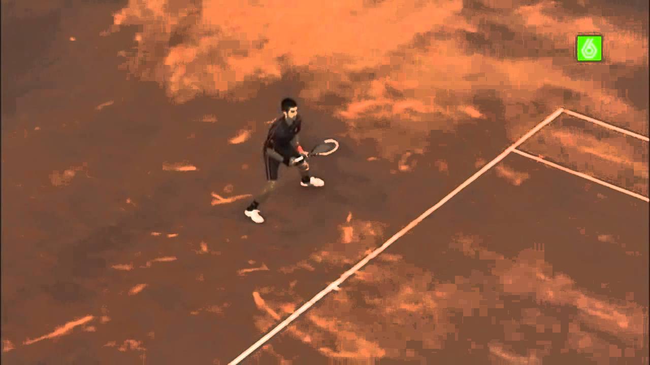 2011Madrid Djokovic serve and rally  from above.avi
