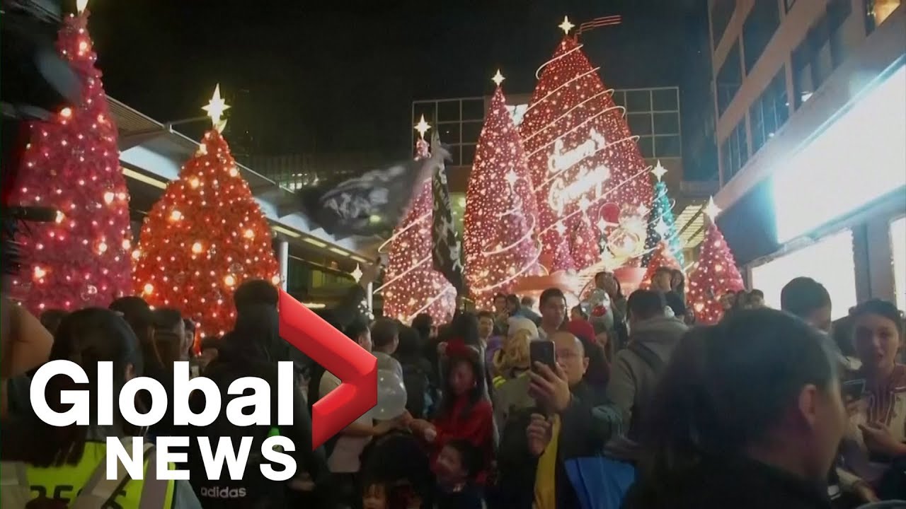 Hong Kong protesters clash with police on Christmas Eve