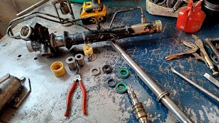 How to repair a Nissan Sentra 98 power steering rack with a leaking power steering fluid screenshot 5