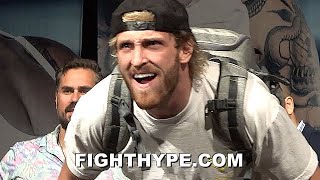 LOGAN PAUL TRIES TO FIGHT A FAN; DARES HIM TO COME ON STAGE & BACK UP 