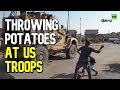 Kurds throw potatoes at US troops withdrawing from Syria