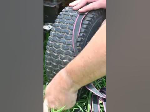 flat lawn mower tire - YouTube