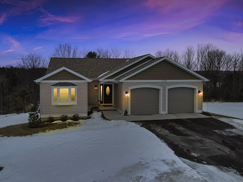 106 Fairway Ct, Kewadin, MI home video tour