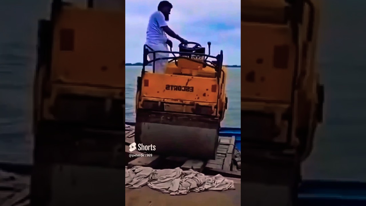 Watch in Horror as Road Roller Sinks While Loading onto Boat... 