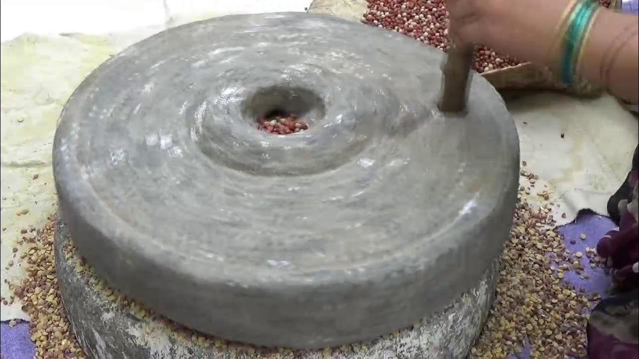 Grind stone. Old Stone grinding flour for movie.