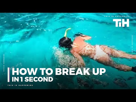 Guy Throws Fish Food at Snorkeling Girlfriend Causing Fish to Swarm Toward Her