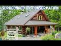This Lakefront Log Home Is Unlike Anything Else in Maine | ME Real Estate