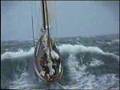 Stormy weather - sailboat in distress at sea