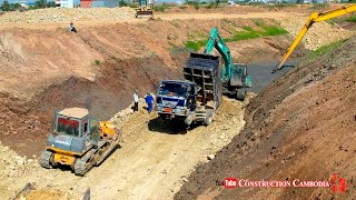 Canal Making Foundation Process in Construction By Dump Trucks Dumping Rock & Bulldozer, Excavators