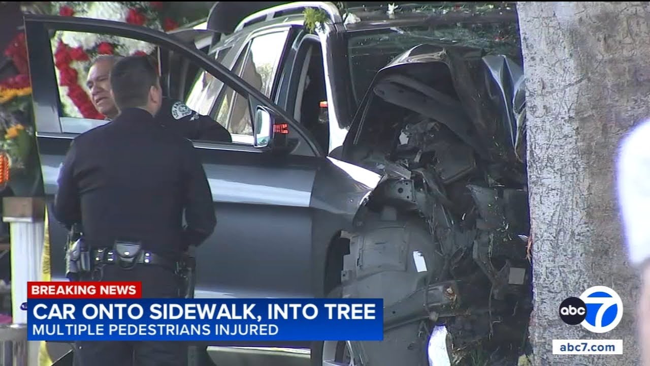 Multiple pedestrians hurt after car crashes onto sidewalk in downtown ...