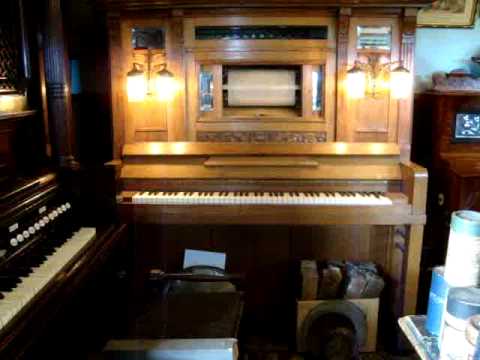 An early 20th century oak nickelodeon/orch...  by ...