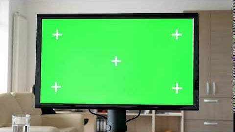 Personal Computer With Big Green Screen  Mock Up on The Table In Living Room Free HD Videos