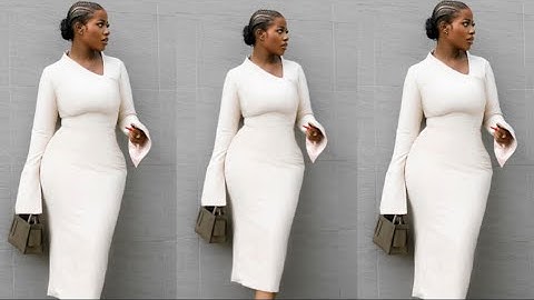 How to sew this stylish corporate dress with a built up asymmetric neckline and a slitted sleeve