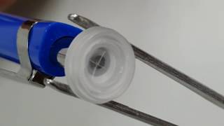 Silicone flow control valve, cross slit valve