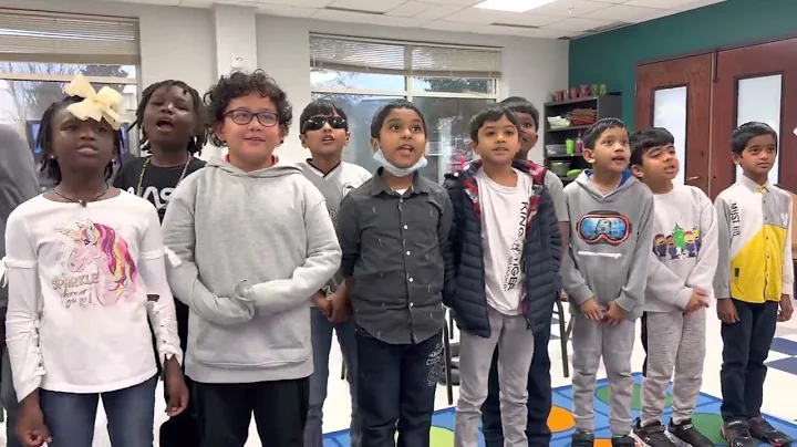 Mr. Polischak's third grade class singing a holiday rap.