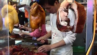 Hong kong street food. action in the kitchen mong kok, kowloon