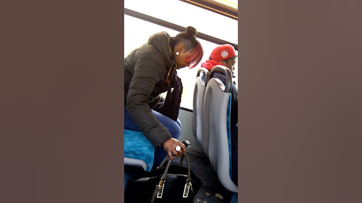 Woman litters on the bus