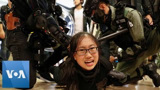 Hong Kong Police Pin Protesters to the Ground During Mall ...