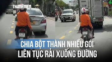 Xác minh clip người phụ nữ ngồi sau xe máy liên tục rải bột lạ gây hoang mang