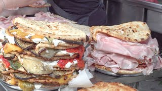 Italian Flat Bread &quot;Spianata&quot; Street Food. Flowing Cheese, Ham and More